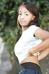 Adolescent ebony babe Serena Blair flashing upskirt strings outdoors