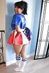 Petite Eastern cheerleader May Lee posing in marvelous uniform and socks