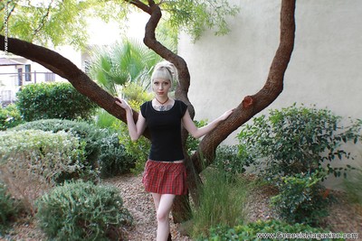 Tattooed fairy girl Symone posing non in nature