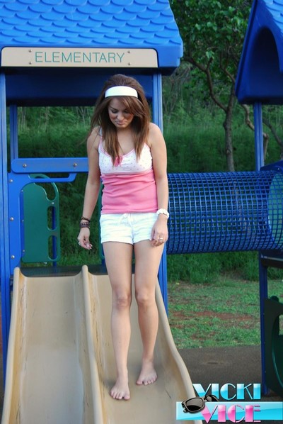 Girl flashing at public playground outdoors