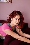 Good redhead prostitute in jeans combination undressing and teasing her slit