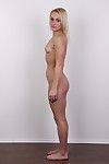 Small blonde model poses naked