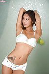 Pornstar Alina Li is demonstrating her mini woman passports in a white lingerie