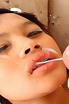 Adult baby Thai model Meme gets a large load of sex cream sprayed across her braces