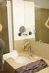 Titsy brunette Carmen Croft caressing her huge love bubbles in the shower