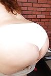 Big-tit brunette Charlotte demonstrates her stunning boobies