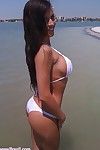 Busty brazilian babe at beach