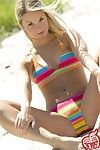 Fascinating blonde teen girl outdoors at beach