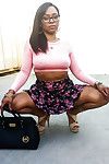 Busty ebony chick Porsha Carrera showing off her string panties and natty apple bottoms