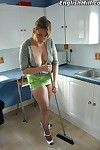 Slutty housewife Daniella in mini skirt and fishnet stockings cleans up her kitchen