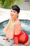 Rachel Aldana dips fall in love with the hot tub in a red fishnet shirt