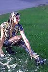 Fixation gal Veronica Diamond covers her body with cream outdoor