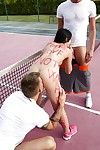 Adolescent slut Lady D gives two boys blowjobs outdoors on tennis court