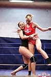 Sporty lesbians grasping each other and licking each other\'s cunts