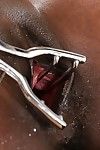 Busty ebony solo girl Jasmine Webb spreading shaved pussy with forceps
