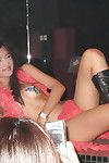 Skinny Chinese dears in boots and erotic lingerie doing erotic dancing