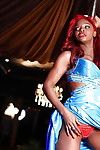 Redhead ebony pornstar Jasmine Webb performing a perspired striptease