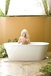 Beautiful busty blonde, Heather Summers, gets appealing in the bathtub soaking her immense love bubbles and smooth shaved pussy!