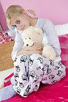 Cute blonde looking alluring in pajamas