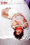 Titsy balled gagged Euro pornstar Kerry Marie undergoing BDSM session