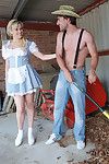 Hunky farm boy is stripped and wanked by four stunning milk maids
