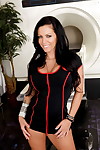 Covered female Jenna Presley location in naughty nurse attire and red boots