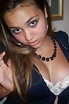Perspired latina gal with nice boobies shows them off in sexy outfits