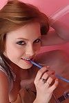 Cute teenager Phoebe is peeing and playing with her enjoyable liquid