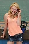 Cute golden-haired coed in glasses Stella Banxxx stripping in the class
