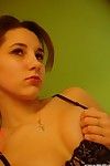 Teen cutie displaying her hot cleavage whereas posing