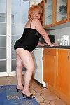 Fatty granny on high heels spreading her ass to show her unyielding holes