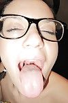 Alluring youthful in glasses pleases a hard dick with her lips and fucks it