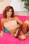 Mature Latina woman Tara Holiday flaunts her huge hooters for close ups