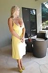 Mature blonde wife with huge milk shakes shows off her gorgeous body outdoor