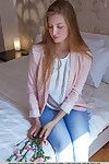 Clothed teen solo girl shedding jeans and panties to let slip shaved snatch