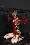 Caged fetish exhibit Latex Lucy licking ass and giving interracial blowjob