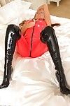 Hot daisy in a red pvc catsuit and thighhigh stiletto boots