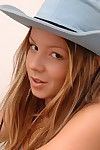 Pretty brunette teen chick wearing hat