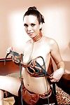 Solo model Jade Nile appears up slave collar and leash around neck