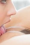 Two sultry ladies start kissing passionately and licking asses