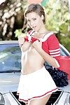Dyke looking cheerleader Bailey Bae bares her small teen gut out of doors